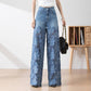 Damen blaue hochtaillierte Jeans mit weitem Bein, Lochmuster und Spitzeneinsätzen